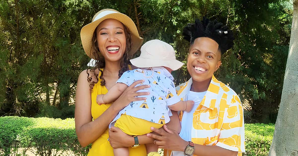 Same-sex parents Sape Maodi-Swartz and Vaivi ‘Vee’ Swartz holding their son, Rainbow